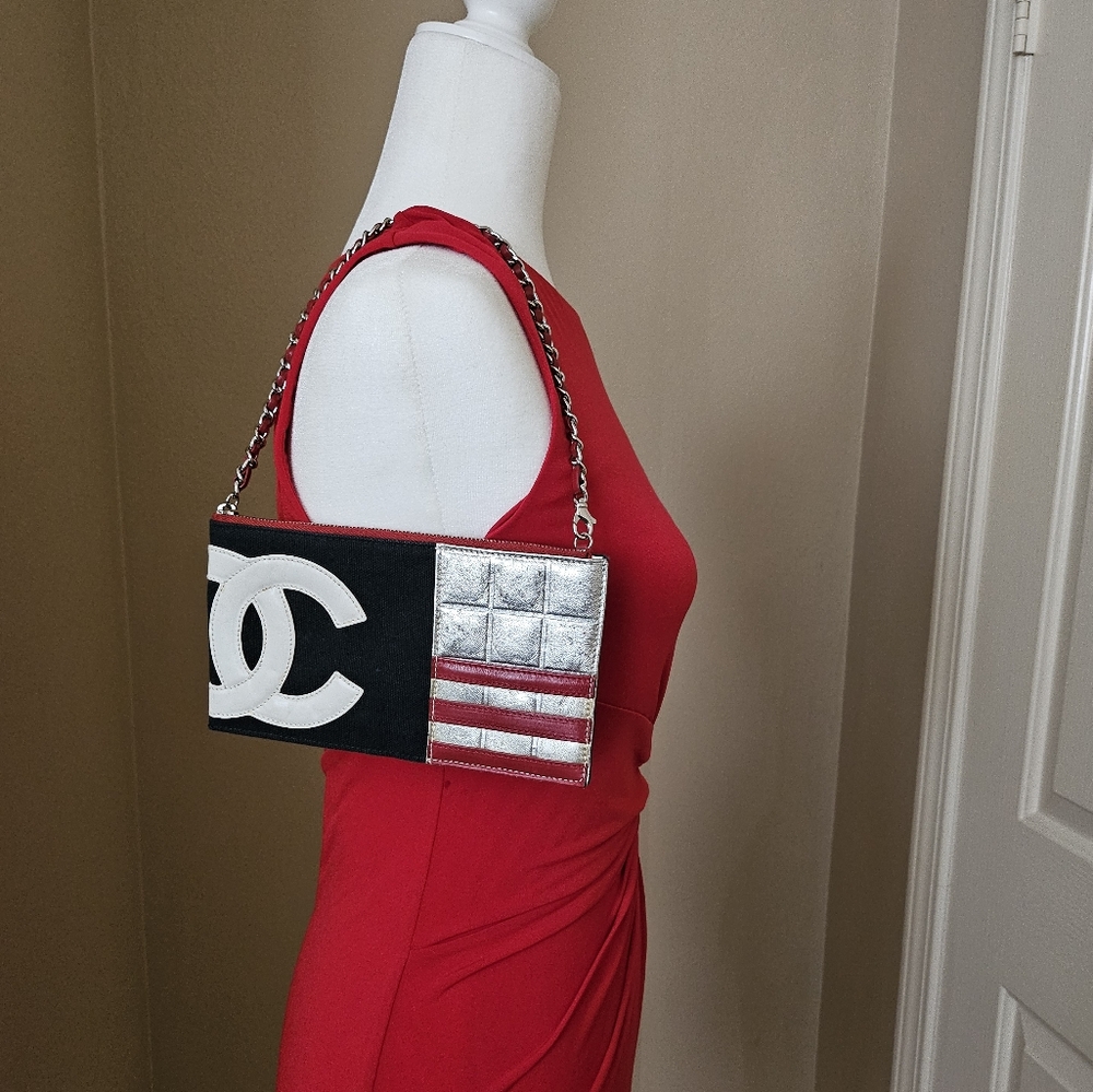 Authentic Chanel navy and red Clutch with Chain